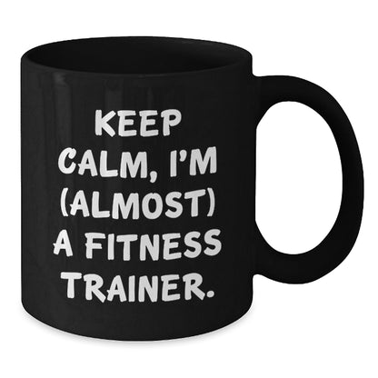Funny Fitness Trainer Gifts, Keep Calm Almost A Trainer, Birthday Black Coffee Mugs for Men, Women, Coworkers, Family, Fitness Enthusiasts, Gifts from Friends - The Buy Boom