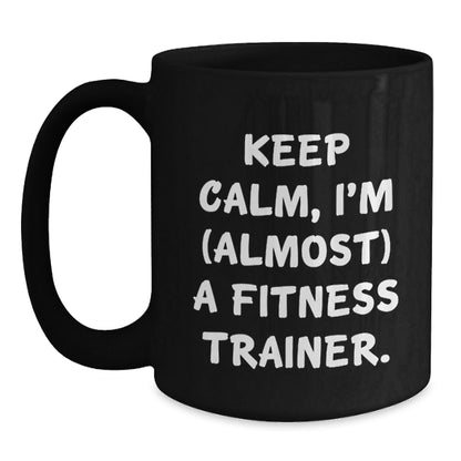 Funny Fitness Trainer Gifts, Keep Calm Almost A Trainer, Birthday Black Coffee Mugs for Men, Women, Coworkers, Family, Fitness Enthusiasts, Gifts from Friends - The Buy Boom
