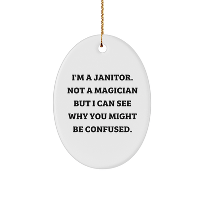 Funny Janitor Gifts from Friends for Janitor - Oval Ornament, White, 3.25" Tall, 'I'm A Janitor. Not A Magician But I Can See Why You Might Be Confused.' - The Buy Boom
