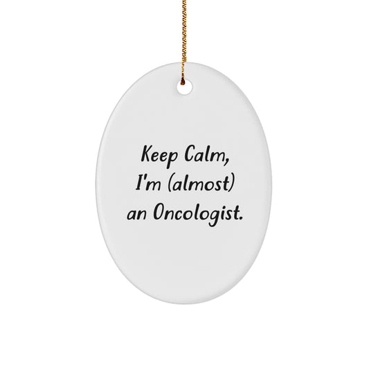 Funny Oncologist Gifts - 'Keep Calm, I'm (almost) An Oncologist.' Oval Ornament for Christmas - The Buy Boom