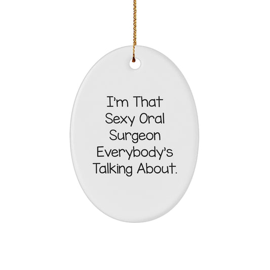 Funny Oral Surgeon Gifts from Friends for Christmas - Oval Ornament with Quote 'I'm That Sexy Oral Surgeon Everybody's Talking About.' - The Buy Boom