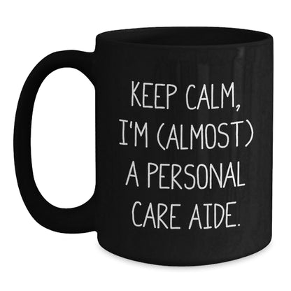 Funny Personal Care Aide Gifts from Friends for Men and Women, Black Coffee Mug with Keep Calm I'm (almost) A Personal Care Aide Quote, Unique Christmas Unique Gift Ideas - The Buy Boom