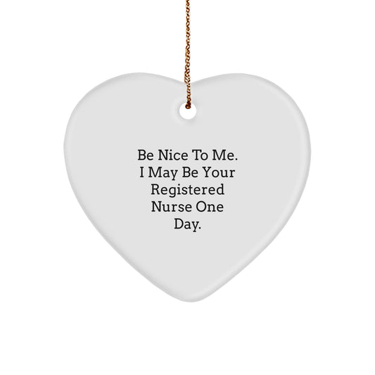 Funny Registered Nurse Gifts from Friends - Be Nice To Me. I May Be Your Registered Nurse One Day. Heart Ornament for Christmas - The Buy Boom