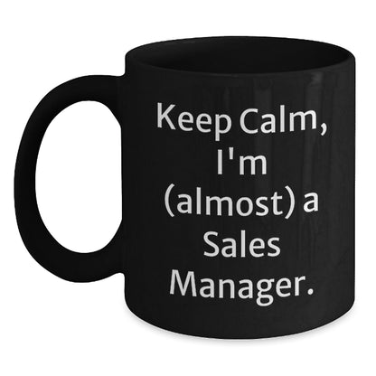 Funny Sales Manager Gift, 'Keep Calm, I'm (almost) A Sales Manager.' Black Coffee Mug for Birthday, Gifts from Friends to Coworkers - The Buy Boom