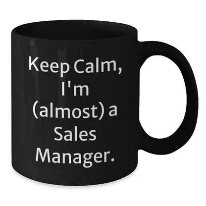 Funny Sales Manager Gift, 'Keep Calm, I'm (almost) A Sales Manager.' Black Coffee Mug for Birthday, Gifts from Friends to Coworkers - The Buy Boom