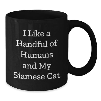 Funny Siamese Cat Lover Gifts from Friends, Siamese Cat Enthusiasts, or Family to Siamese Cat Owners on Birthday, I Like A Handful Of Humans And My Siamese Cat Black Coffee Mug - The Buy Boom
