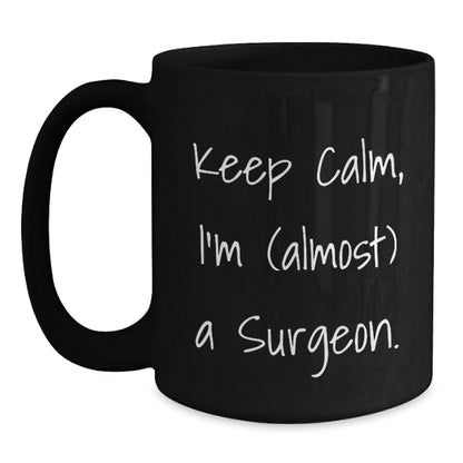Funny Surgeon Gifts, 'Keep Calm, I'm (almost) A Surgeon.' Black Coffee Mug for Graduation, Gifts from Family, Friends, or Coworkers for Surgeons - The Buy Boom