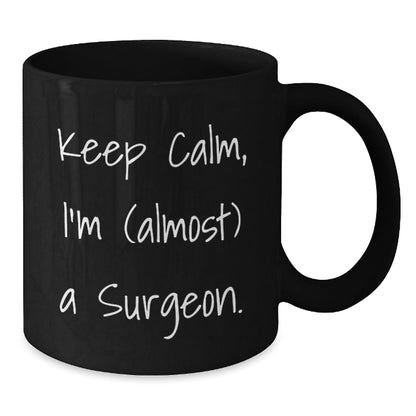 Funny Surgeon Gifts, 'Keep Calm, I'm (almost) A Surgeon.' Black Coffee Mug for Graduation, Gifts from Family, Friends, or Coworkers for Surgeons - The Buy Boom