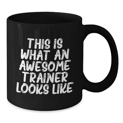 Funny Trainer Gifts from Friends - Inspirational Black Coffee Mug for Graduation, 'This Is What An Awesome Trainer Looks Like' - Unique Gifts for Trainer, Men, or Women - The Buy Boom