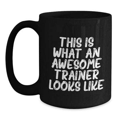 Funny Trainer Gifts from Friends - Inspirational Black Coffee Mug for Graduation, 'This Is What An Awesome Trainer Looks Like' - Unique Gifts for Trainer, Men, or Women - The Buy Boom