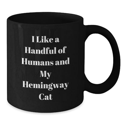 Hemingway Cat Gifts Funny Quote Black Coffee Mug, Gifts from Men to Friends for Birthday, I Like A Handful Of Humans And My Hemingway Cat - The Buy Boom