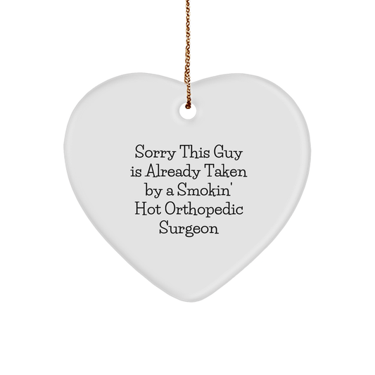 Orthopedic Surgeon Gifts from Friends for Christmas - Heart Ornament with Funny Quote, 'Sorry This Guy Is Already Taken By A Smokin' Hot Orthopedic Surgeon' - The Buy Boom