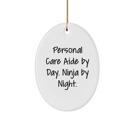 Personal Care Aide Gifts by Day, Ninja Gifts by Night - Funny Oval Ornament, White, 3.25" Tall, Perfect for Christmas Unique Gifts from Friends to Family - The Buy Boom
