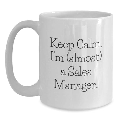 Sales Manager White Coffee Mug, Funny Quote 'Keep Calm, I'm (almost) A Sales Manager.' for Birthday Unique Gifts from Friends, Coworkers, or Family - The Buy Boom